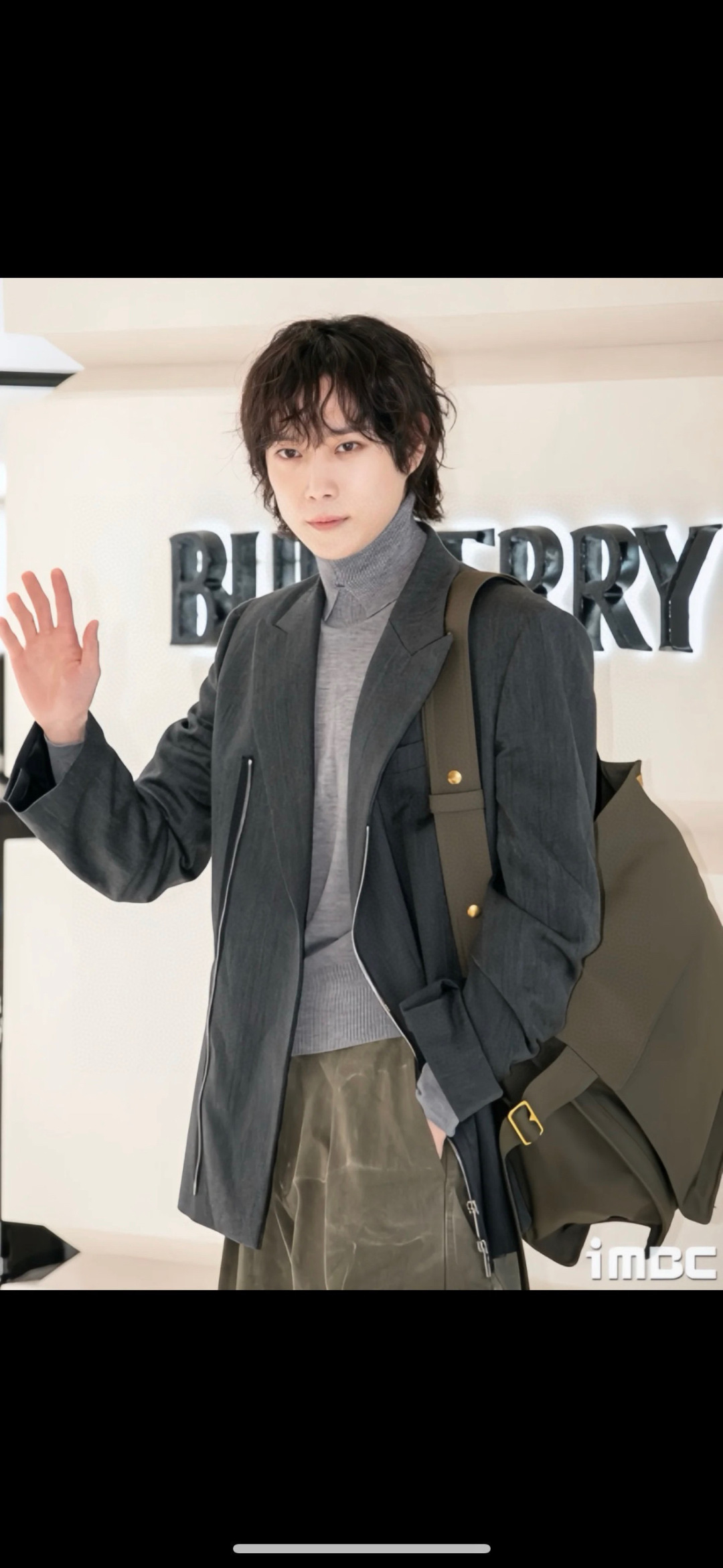 Burberry Canvas and leather-trimmed messenger bag