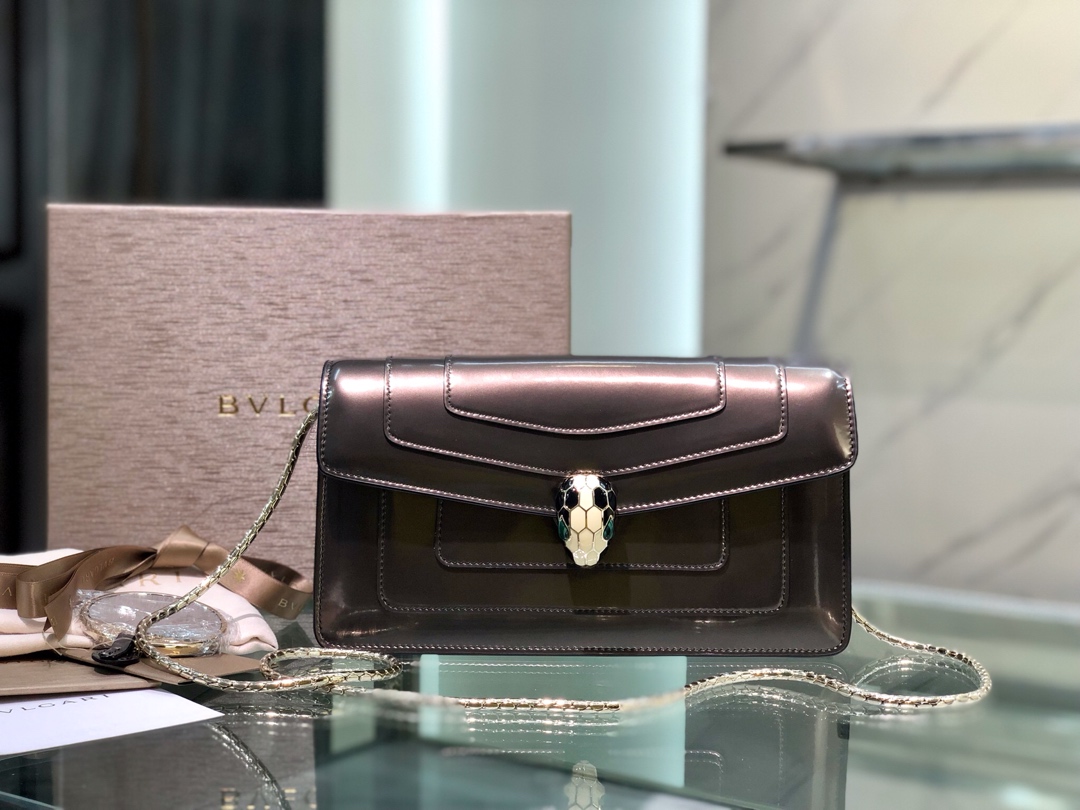 Serpenti leather handbag Bvlgari Black red in Leather –
