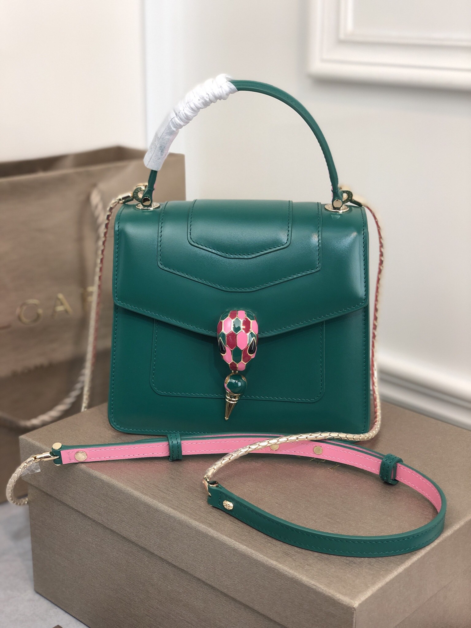 Bvlgari green/pink logo Patent And Leather Isabella Rossellini Top Handle Bag Bvlgari | TLC