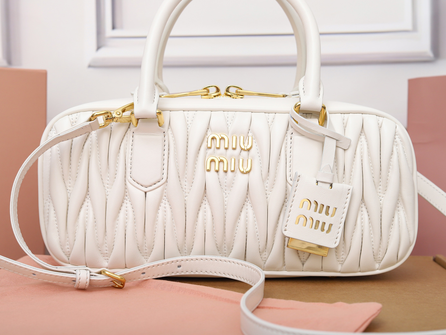 Miu Miu Logo-plaque Matelassé Leather Mini Bag In White |