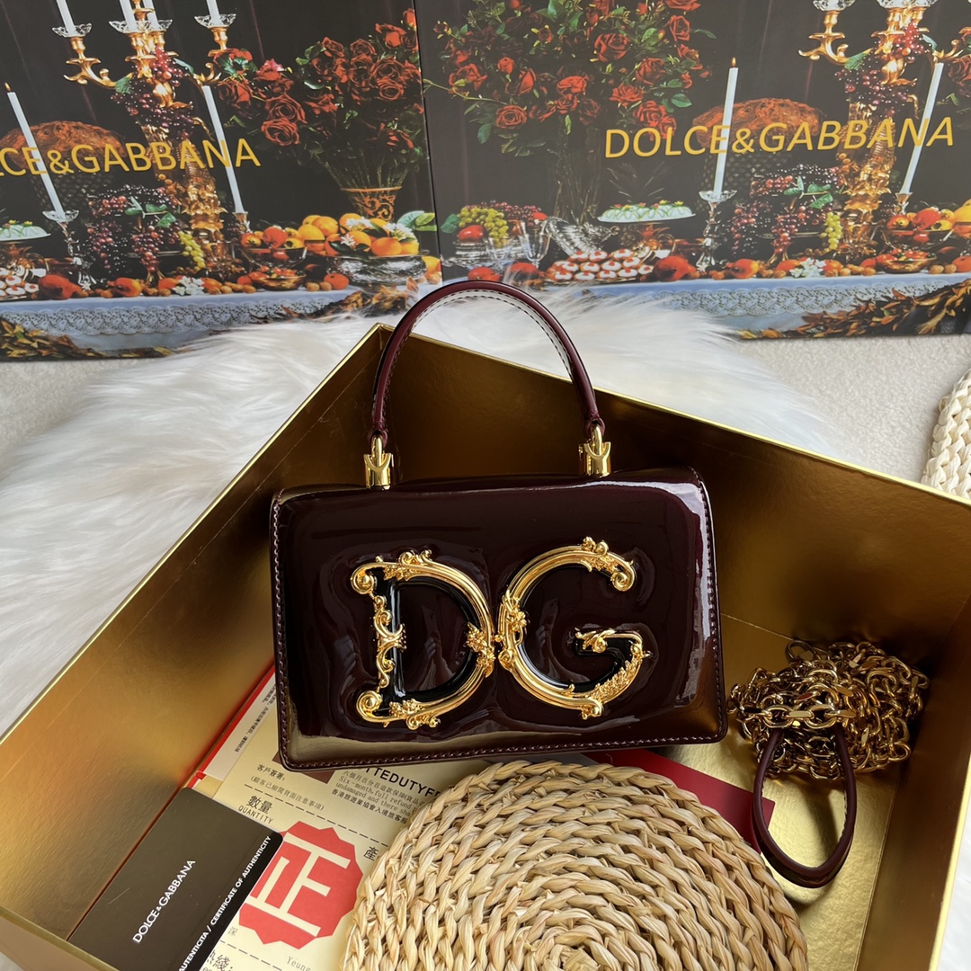 Dolce & Gabbana Calfskin DG Girls phone bag in Pale redfor Women |