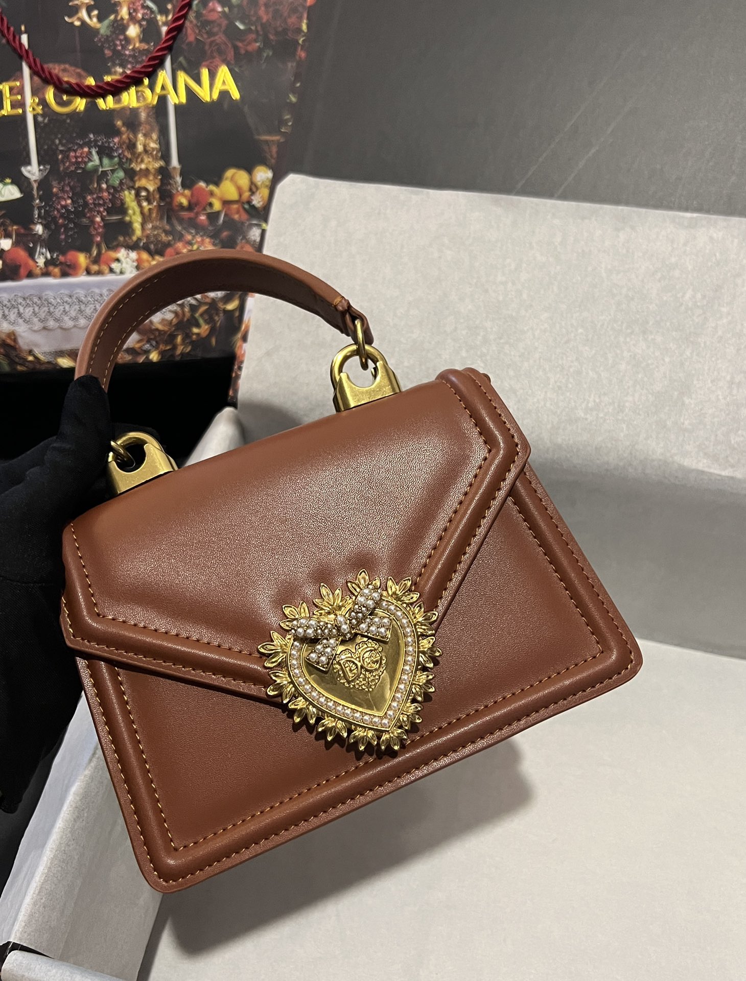Dolce & Gabbana Small Devotion top-handle bag in Beige for Women