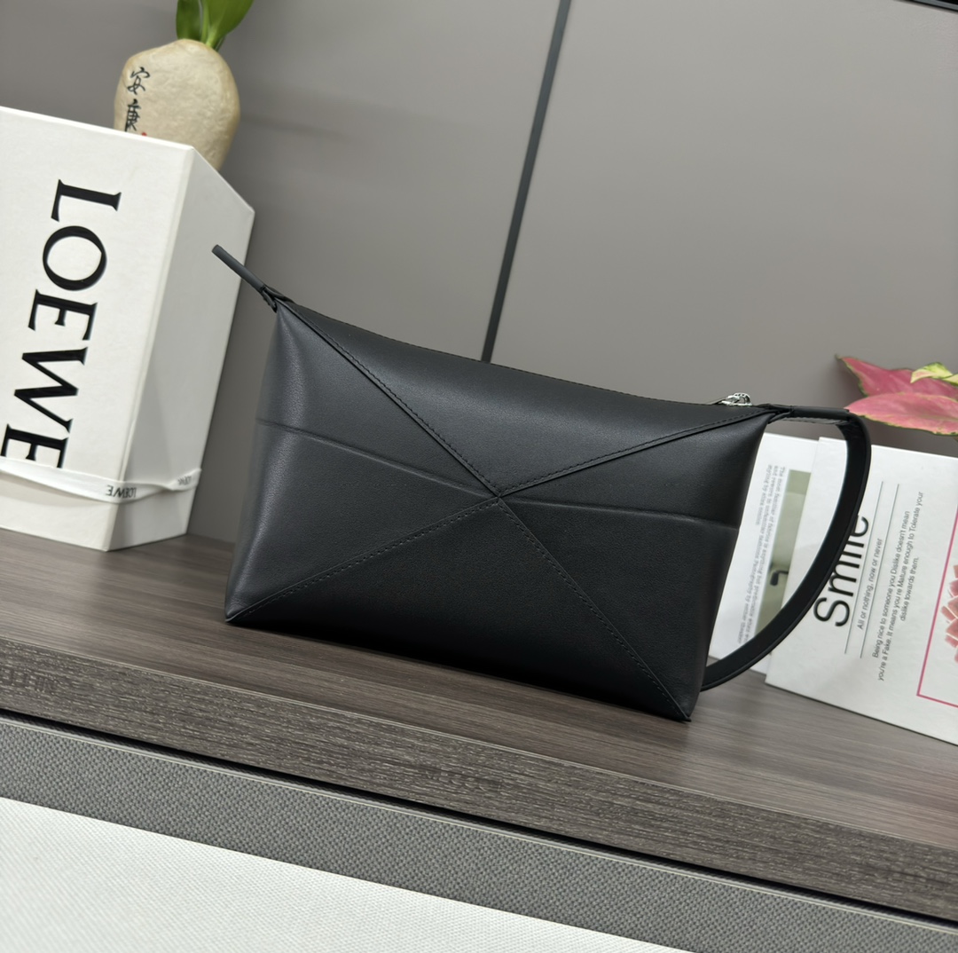 Loewe Puzzle Fold wash bag in shiny calfskin Black – LOEWE