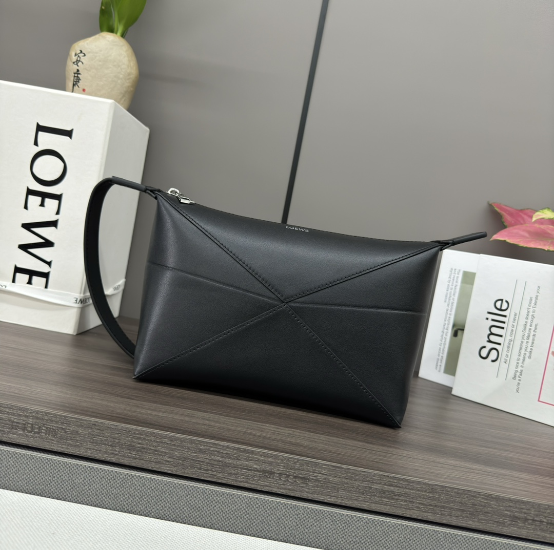 Loewe Puzzle Fold wash bag in shiny calfskin Black – LOEWE
