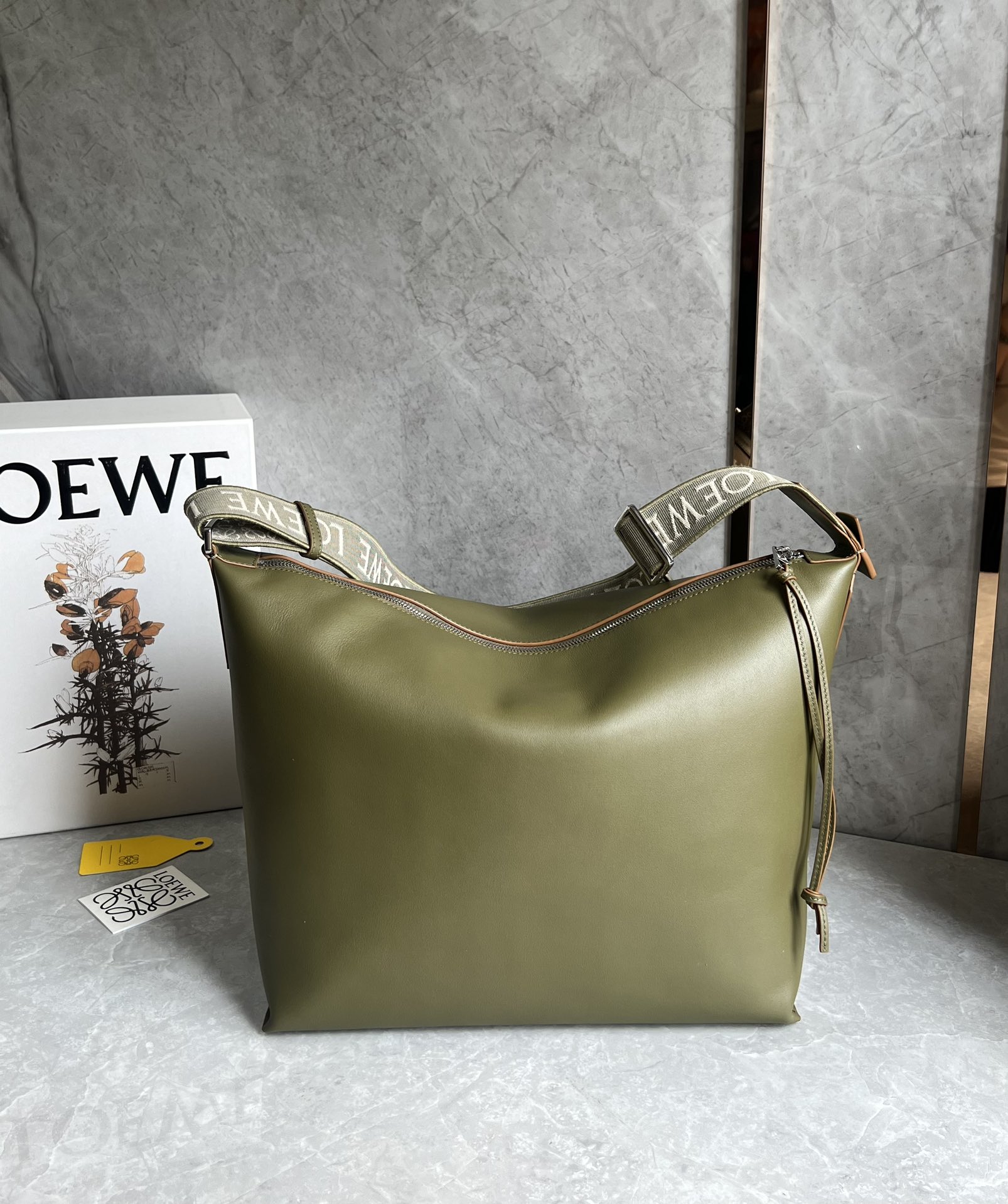 Loewe Cubi crossbody bag in supple smooth calfskin and jacquard green