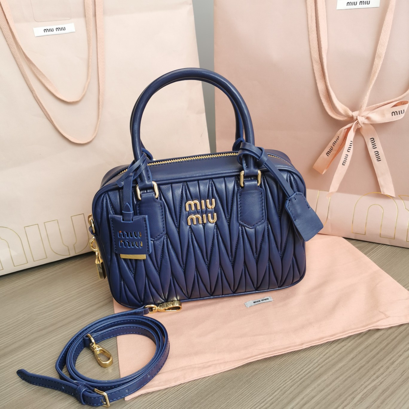 Arcadie leather crossbody bag Miu Miu Blue  in Leather –