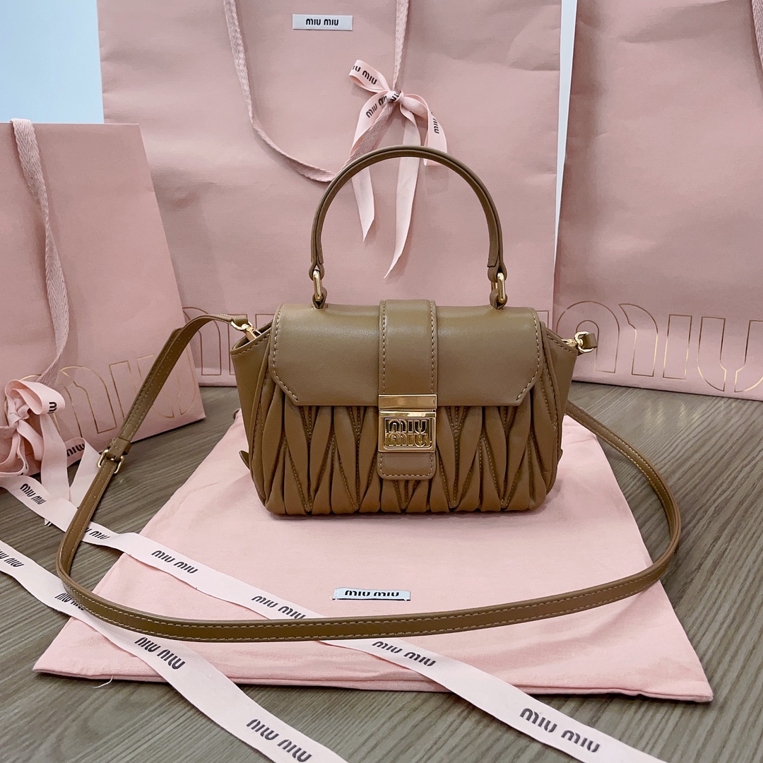 Miu Miu Matelassé top handle bag for Women – bang in brown Beige in UAE9
