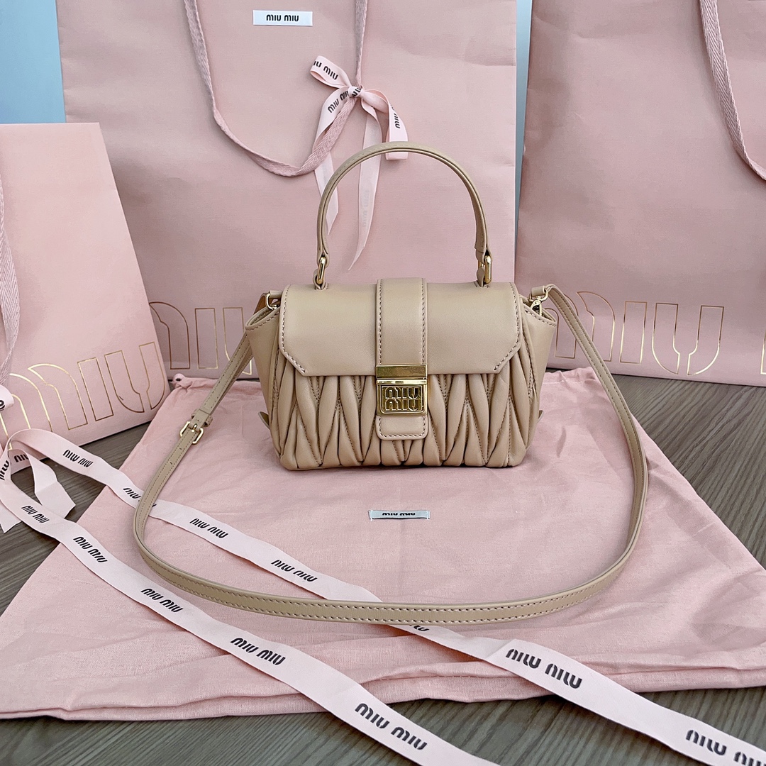 Miu Miu Matelassé top handle bag for Women – Beige in U