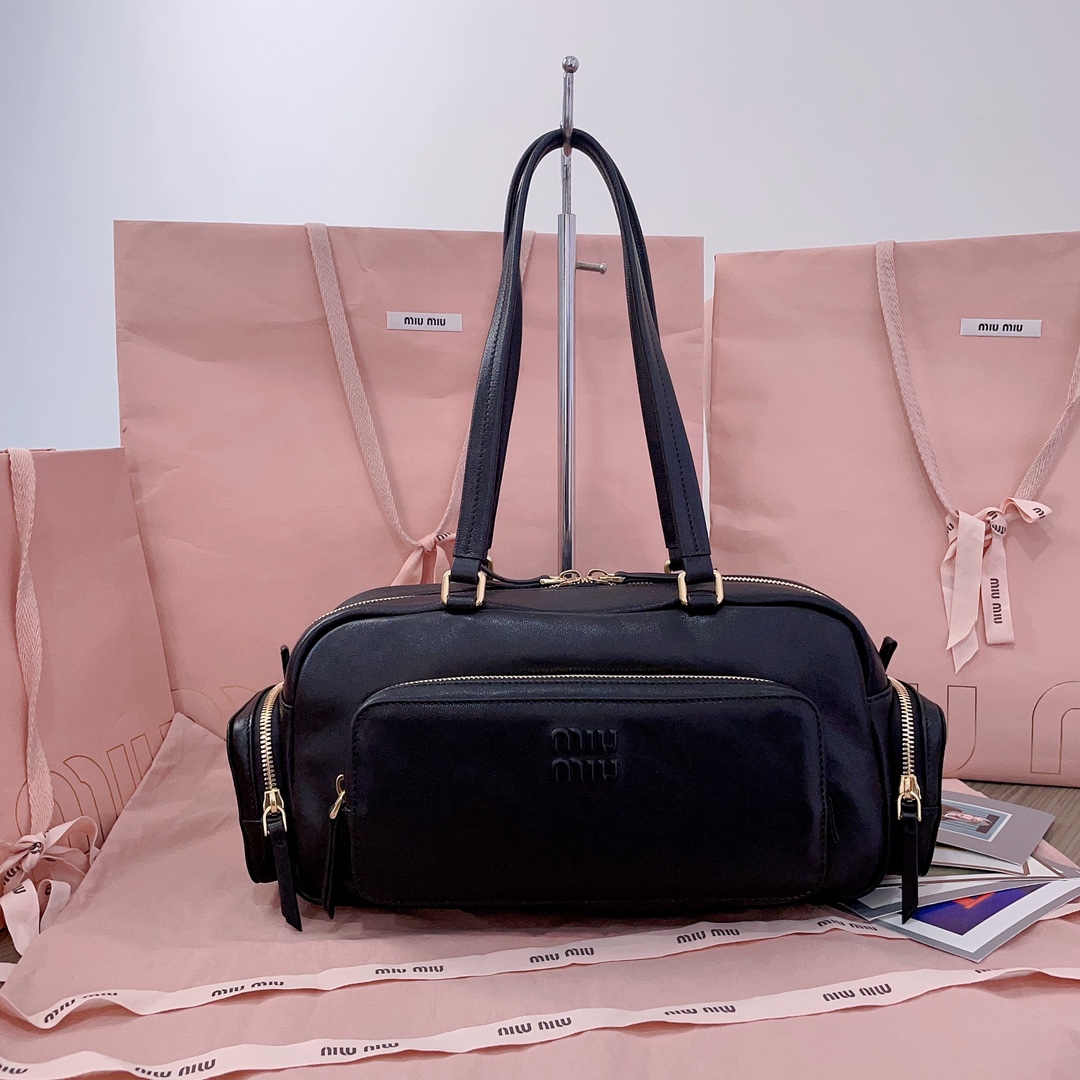 Miu Miu Pocket embossed-logo Bag | Black |