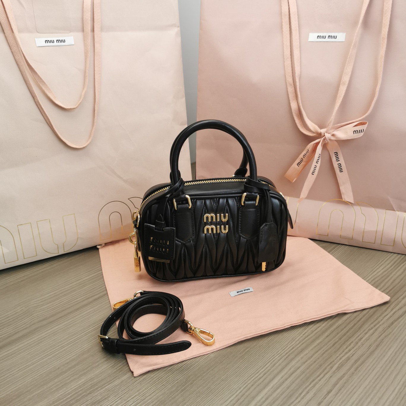Miu Miu Logo-Plaque Matelassé Leather Mini Bag – Black for Women