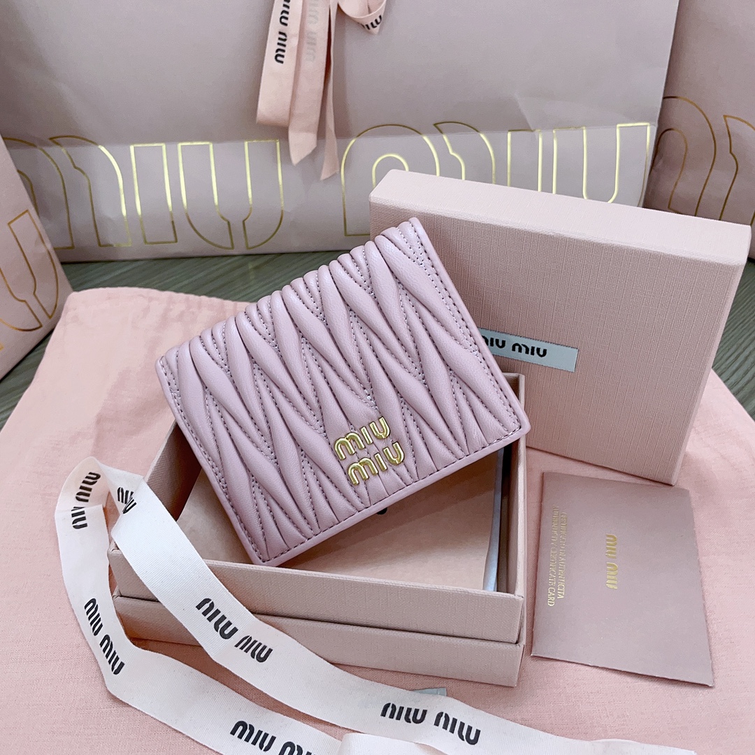 Miu Miu Small matelassé nappa leather wallet color  purple