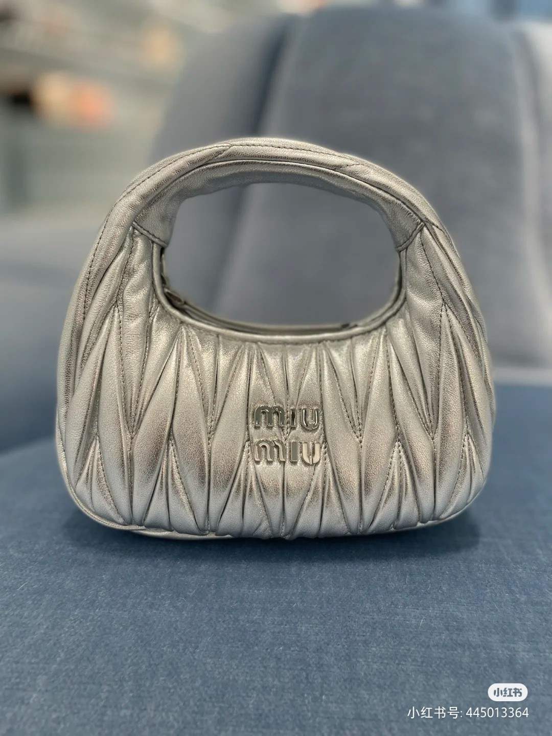 MIU MIU Metallic Nappa Matelasse Mini Wander Hobo bag in siver