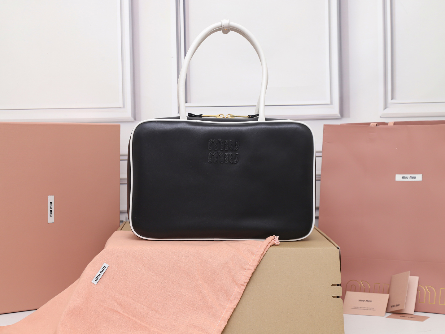 Miu Miu Black/white Beau Leather Bag Miu Miu Leather Beau Top-Handle Bag | | Miu Miu
