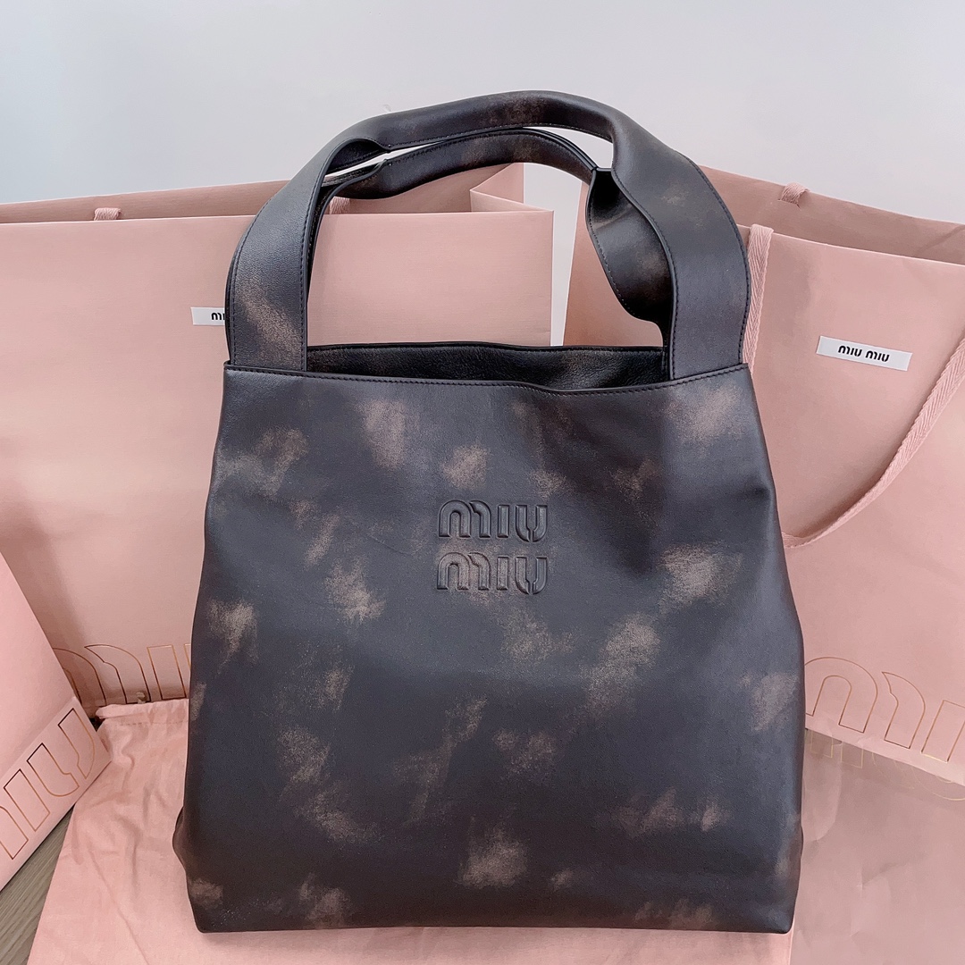 Miu Miu Distressed Effect Logo Embossed Shoulder Bag in