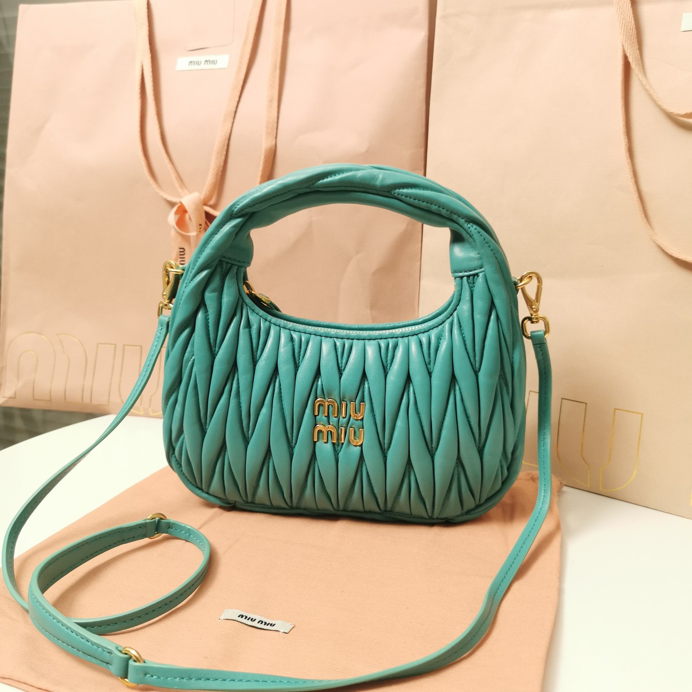 Miu Miu Lagoon Blue Wander Matelassé Nappa Leather Hobo Mini-bag |