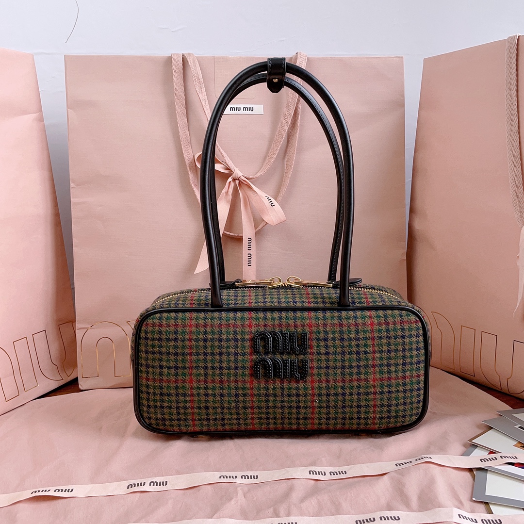 Miu Miu Beau top-handle tratan bag with leather details