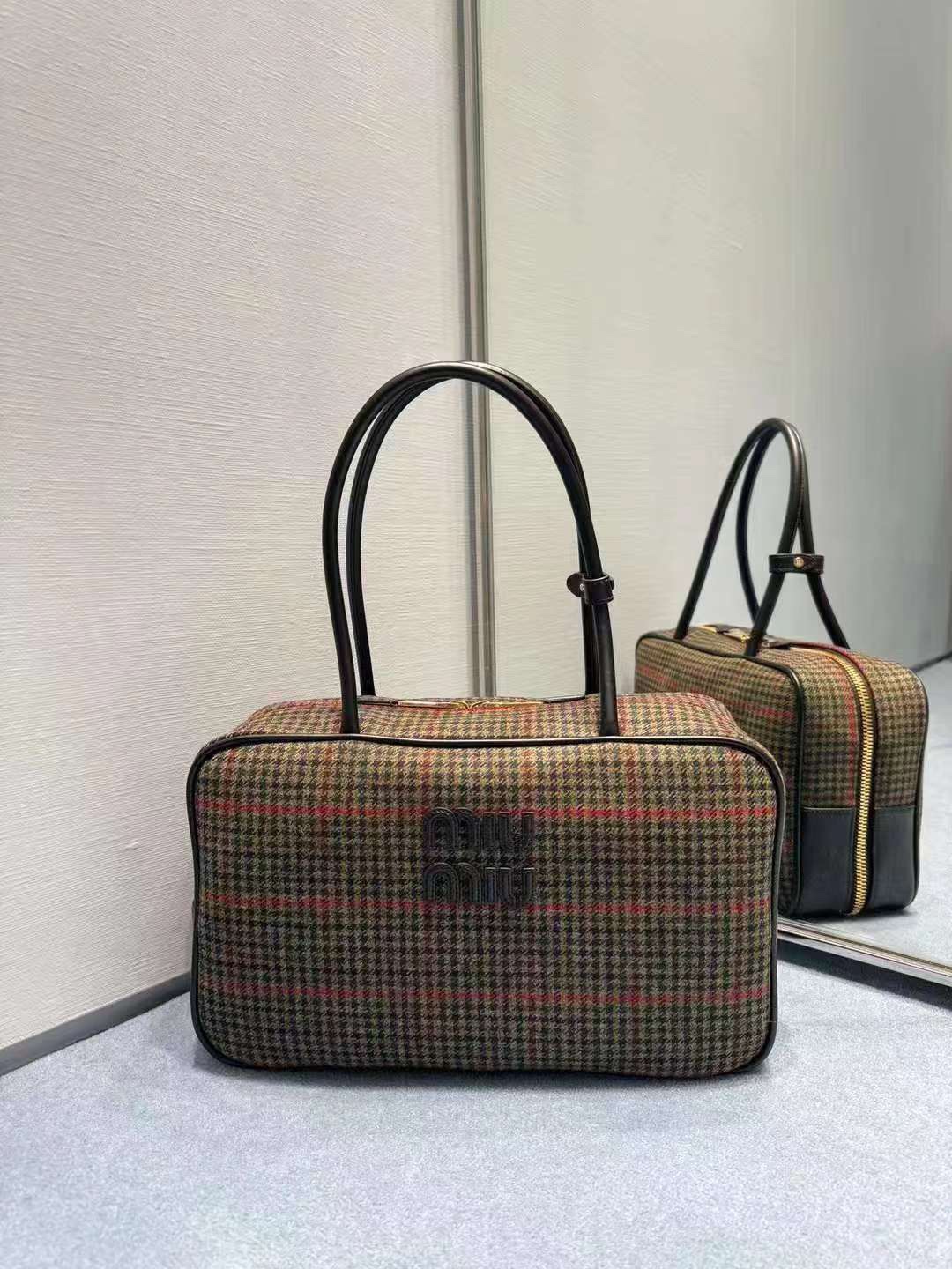 Miu Miu Beau tartan top-handle bag with leather details |