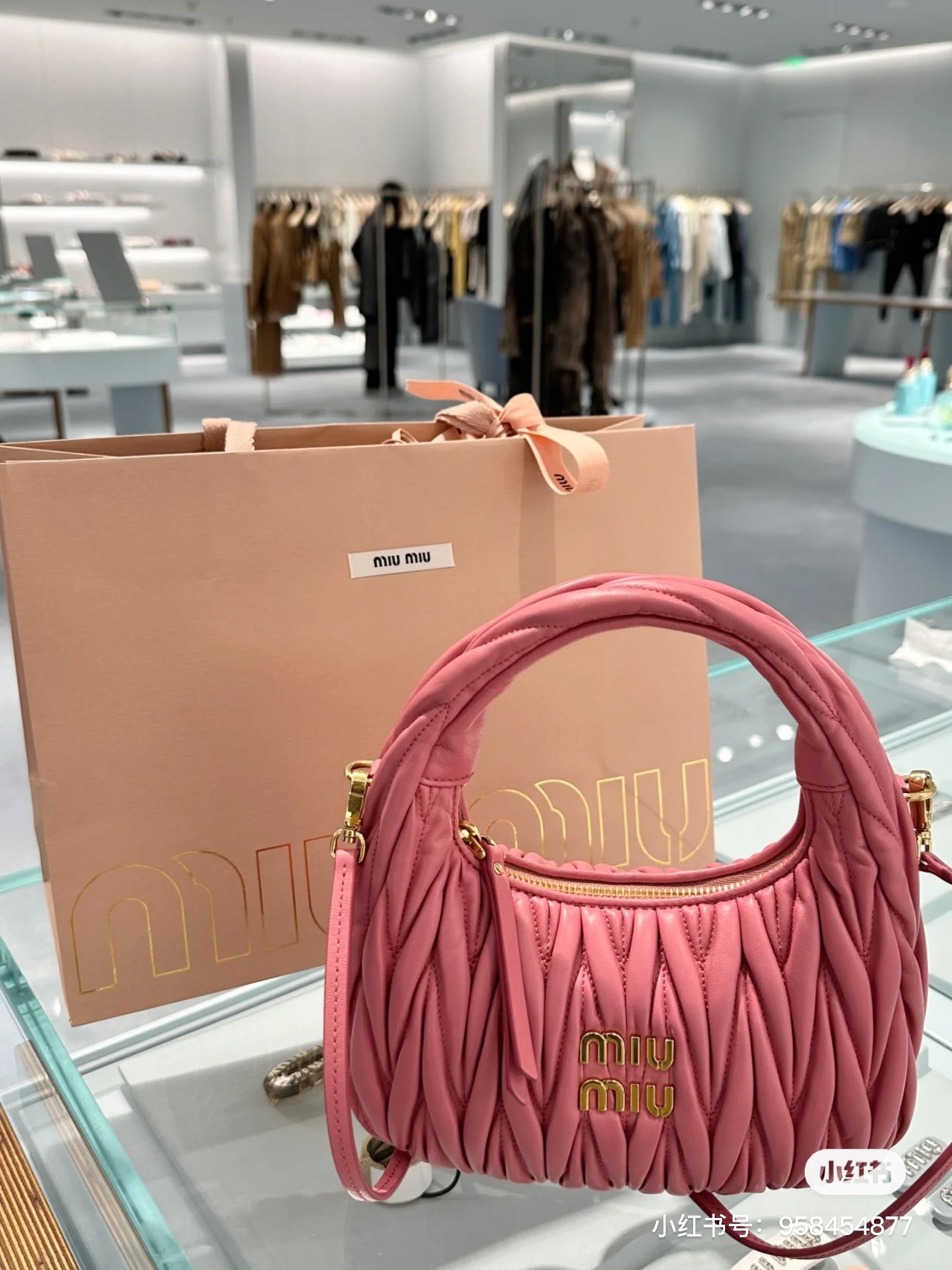 Miu Miu Wander matelassé nappa leather hobo bag Mango | Miu