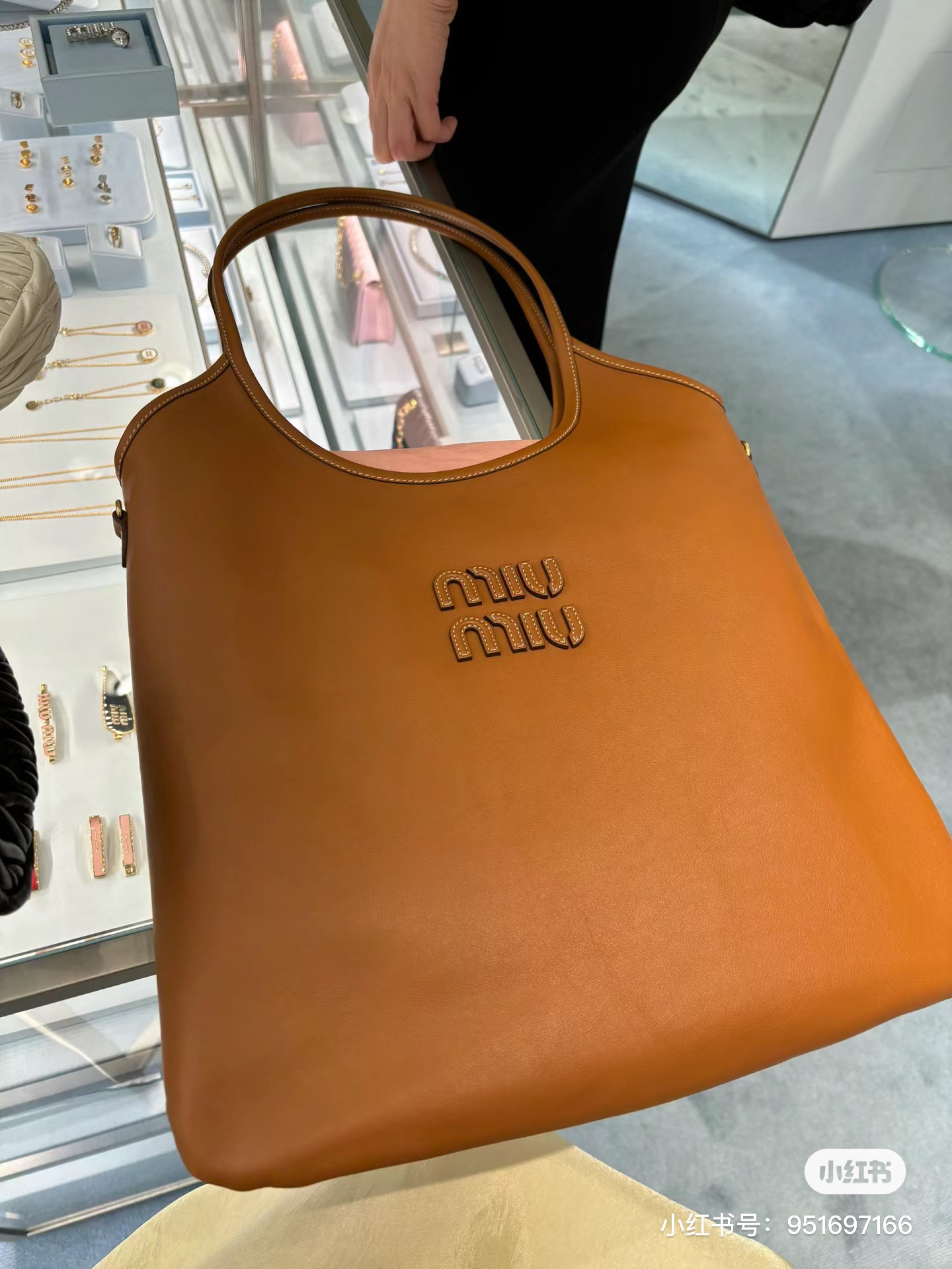 Miu Miu Ivy Brand-Embossed Leather Tote Bag – Cognac | Editorialist