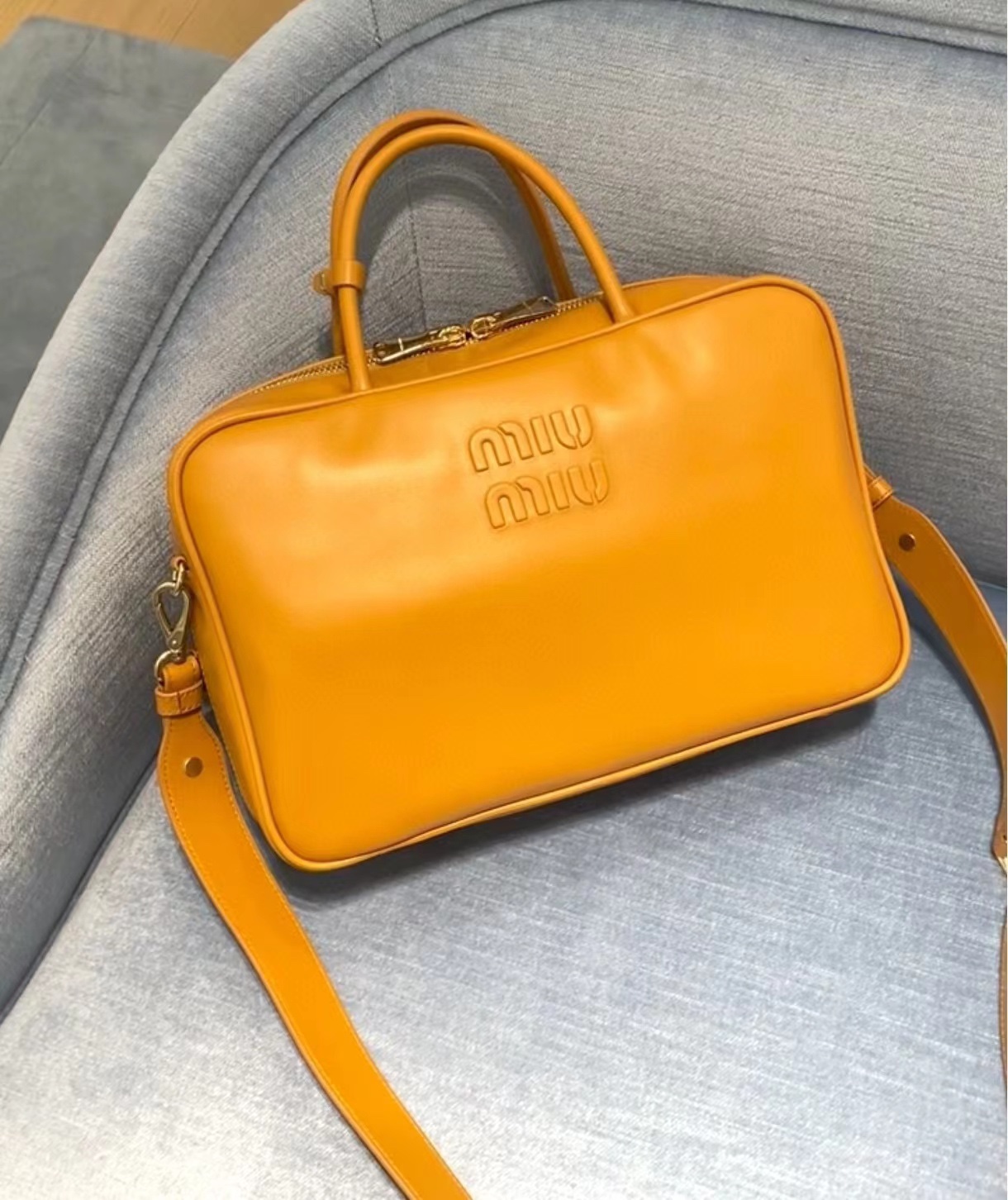 Miu Miu logo-embossed Leather Top Handle Bag | Yellow