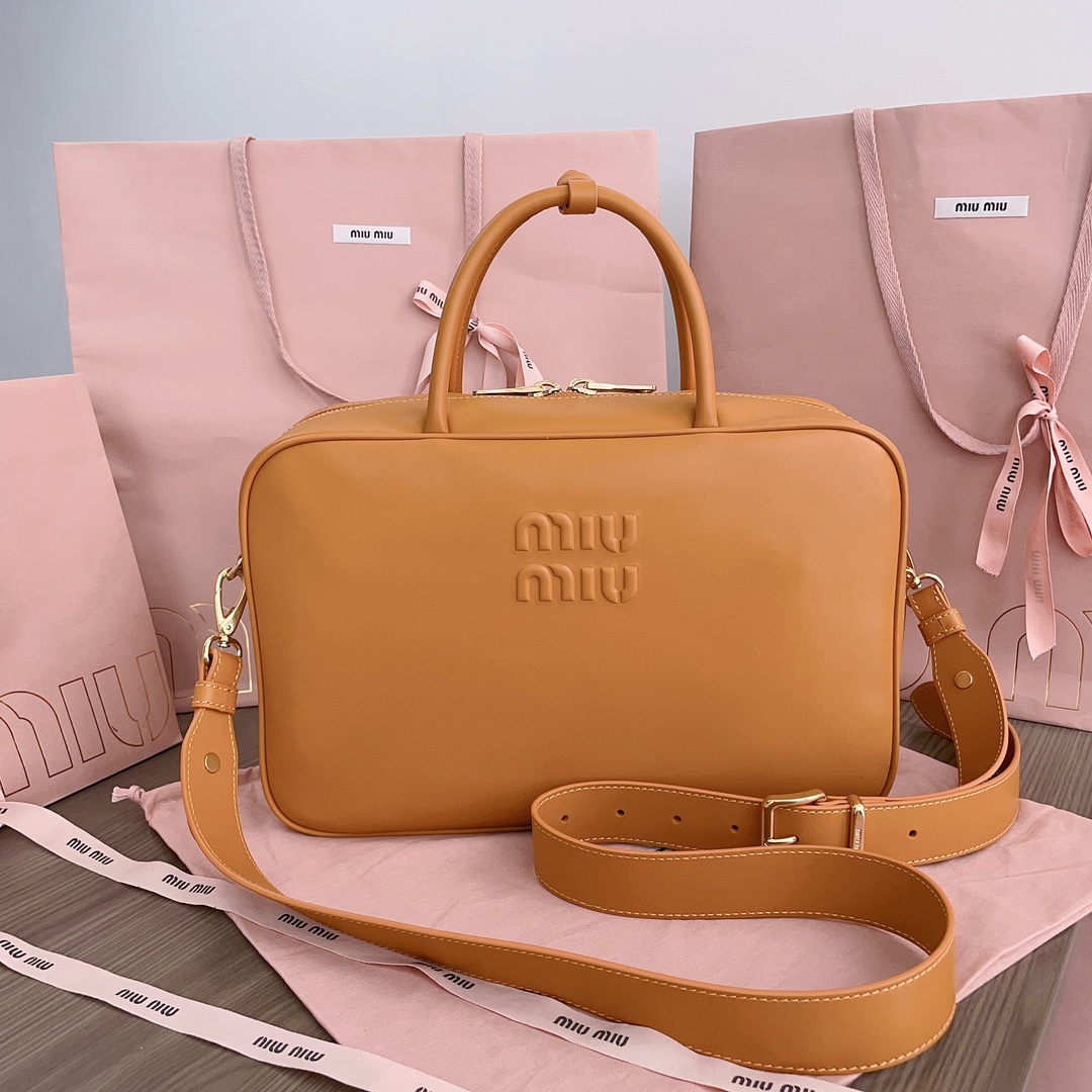 Miu Miu logo-embossed Leather Top Handle Bag | Yellow