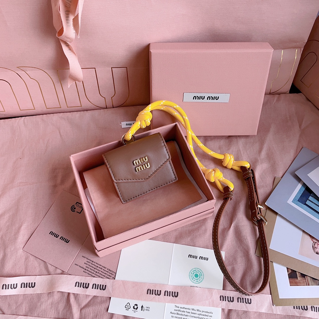 Miu Miu Mini-pouch leather, cord, and metal trick for Women