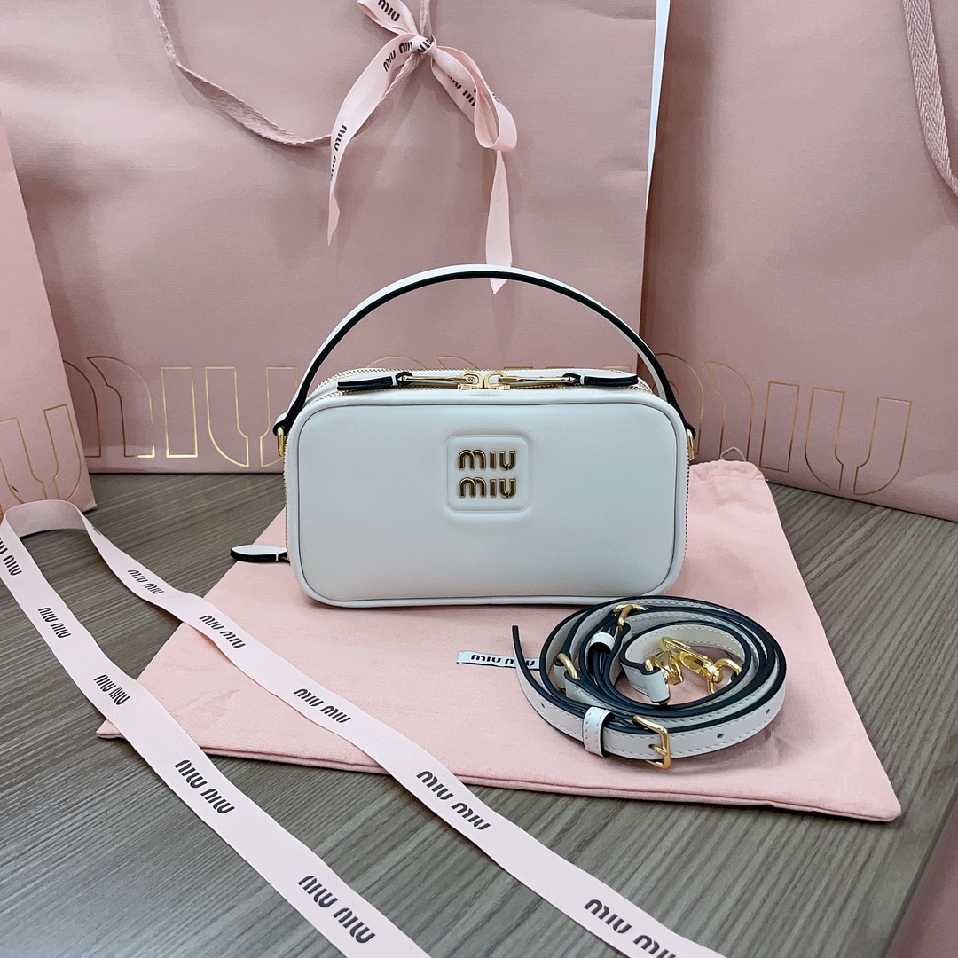 Miu Miu Handbags in Metallic | white Miu Miu