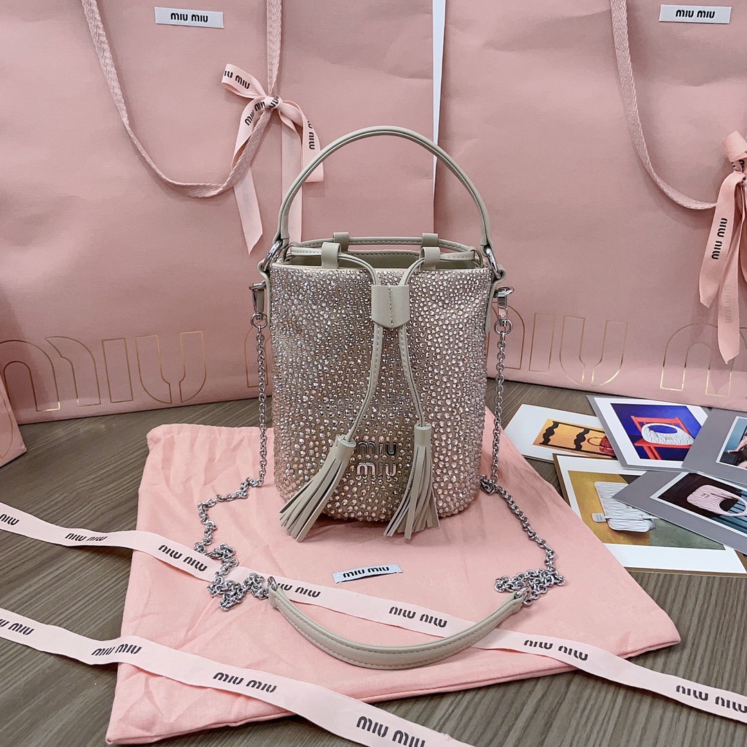 Miu Miu Satin bucket bag with synthetic crystals |