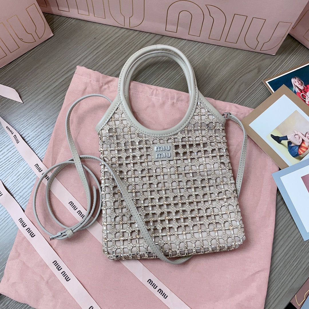 Miu Miu Structured satin handbag featuring chainmail  gray