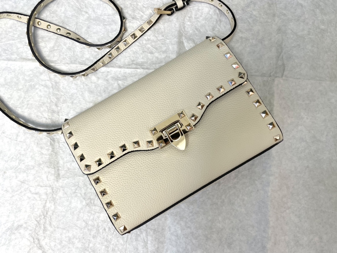 Valentino Small Rockstud Grainy Calfskin Crossbody Bag for Woman in Saddle white