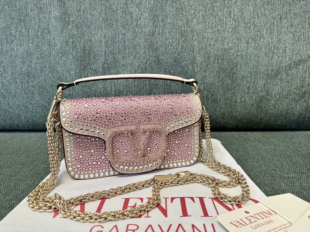 Valentino Garavani Lambskin Locò Cross-Body Bag |