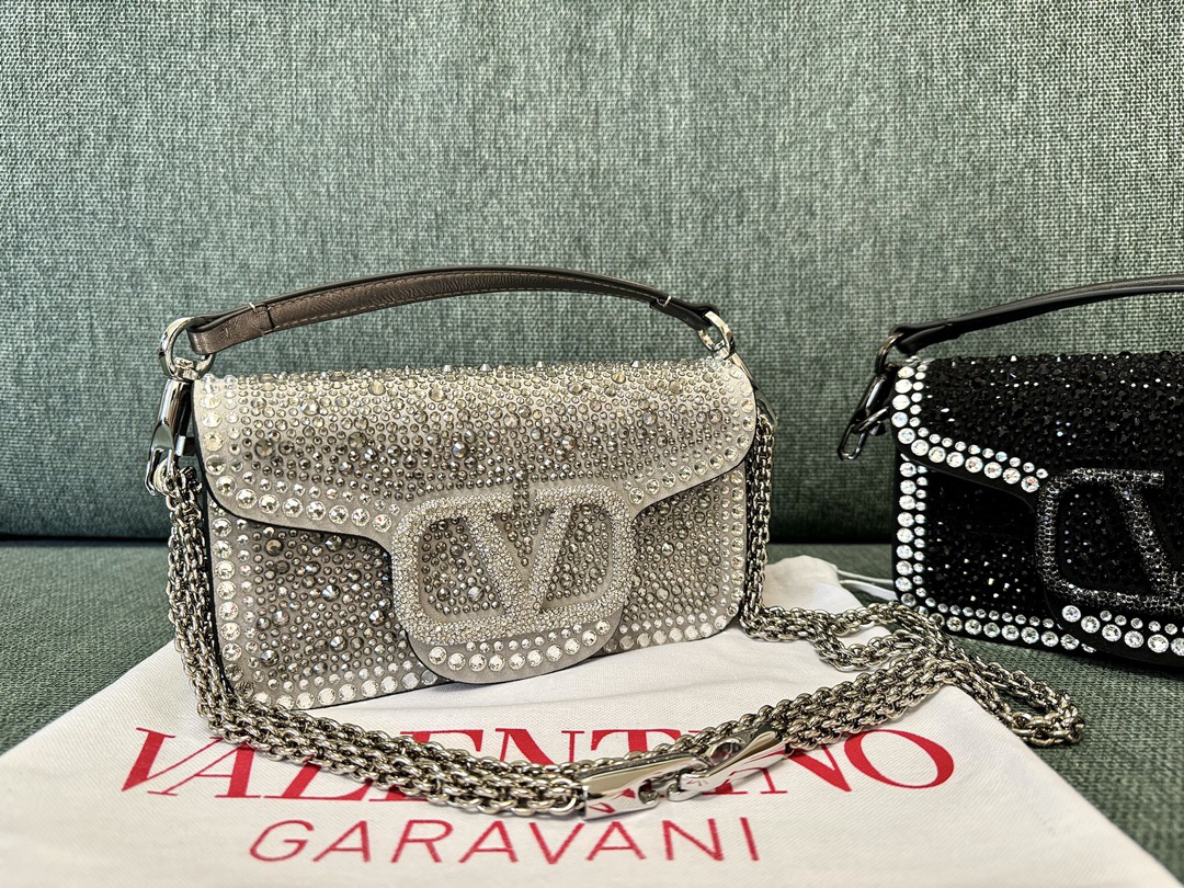 Valentino Garavani Lambskin Locò Cross-Body Bag |