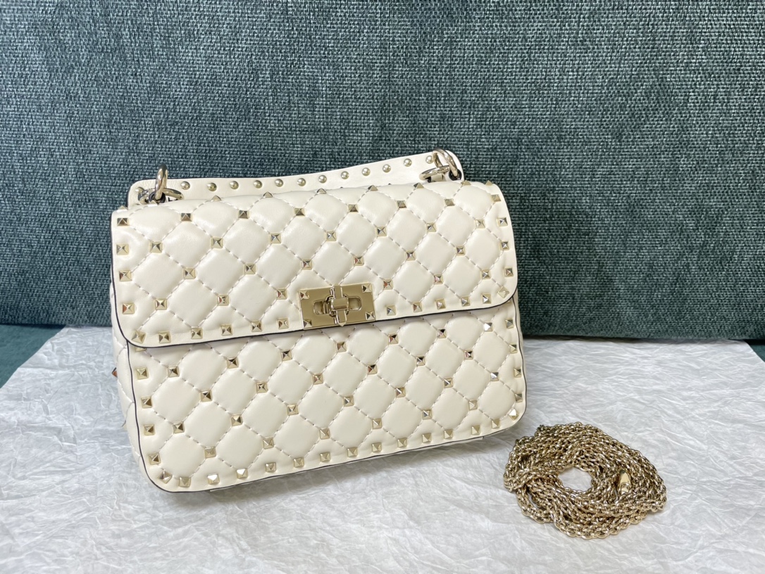 Valentino Garavani Medium Rockstud Spike Top-Handle Bag | Harrods US