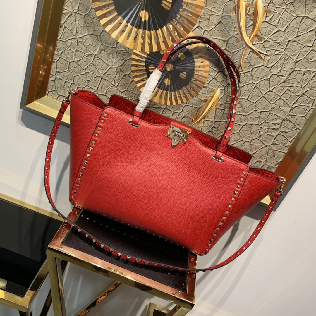 VALENTINO GARAVANI Pebbled Calfskin Medium Rockstud Tote red