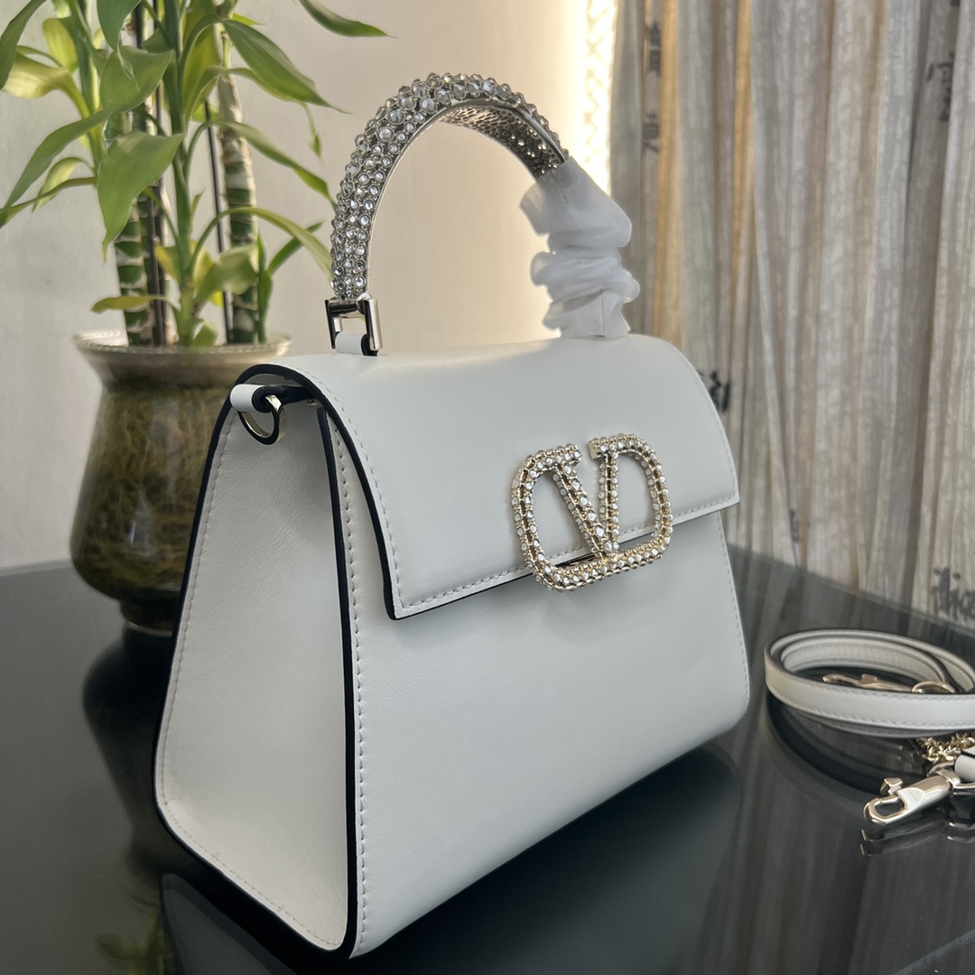 Valentino Garavani Small VSling Embellished Handbag | Neutrals