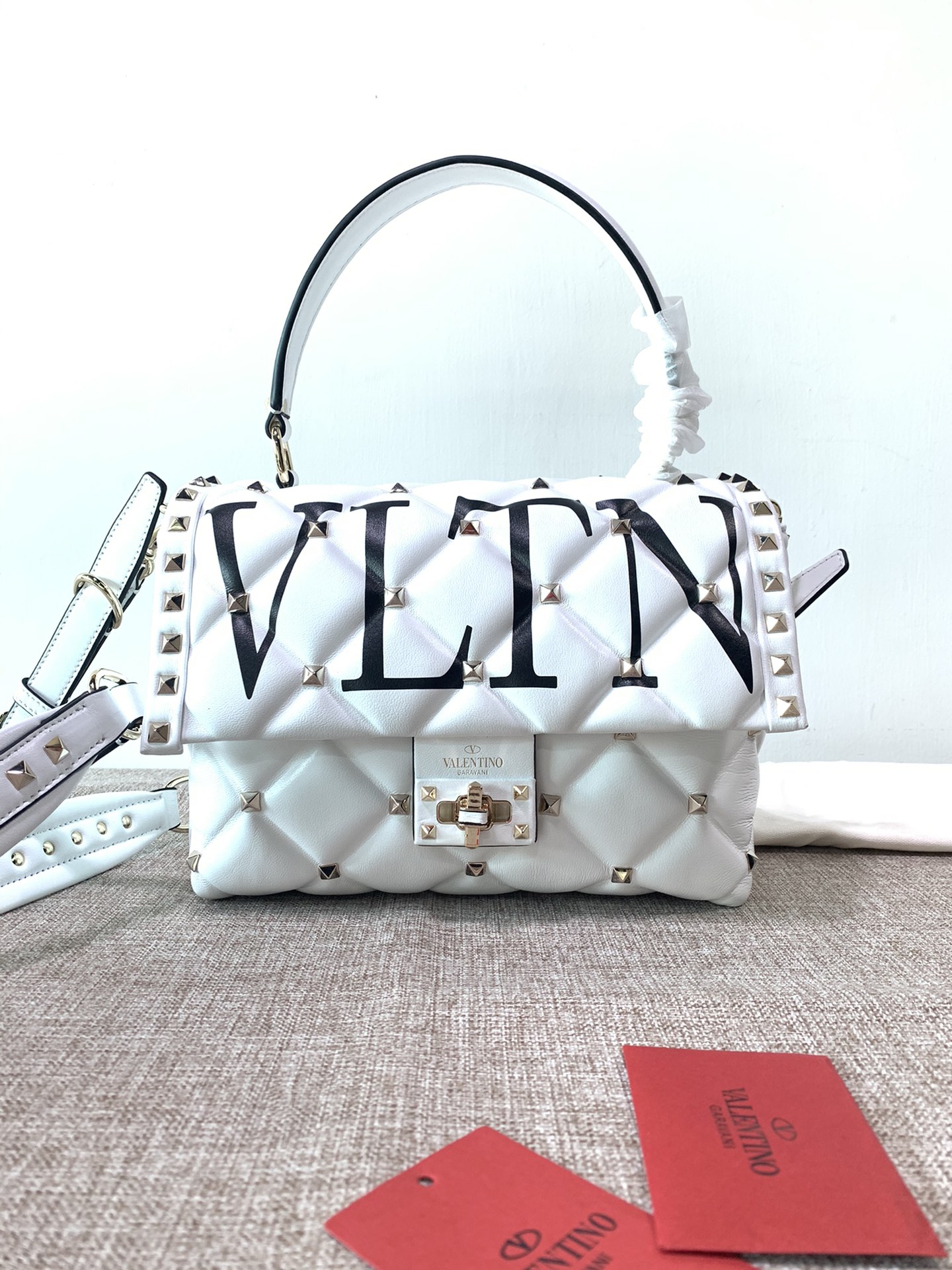 Valentino Garavani Rockstud Top Handle Leather Crossboday Bag on SALE