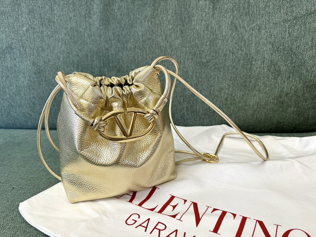 Valentino Garavani V Logo Drawstring Bag in Mekong